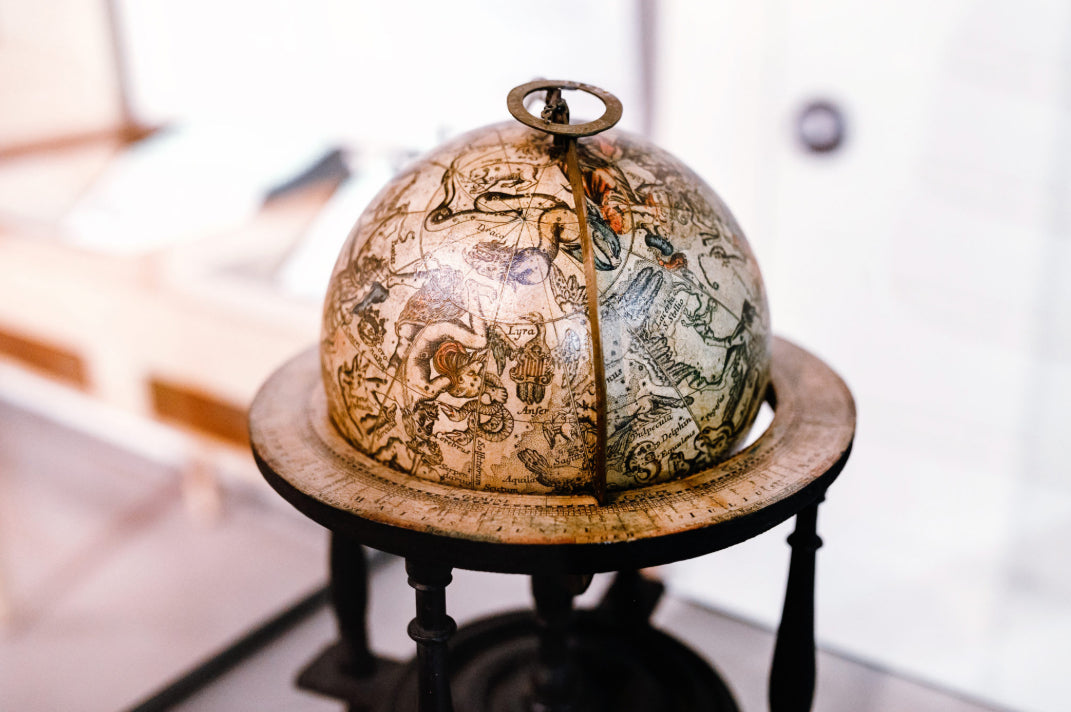 The Astronomical Cartography: Star Charts and Celestial Globes
